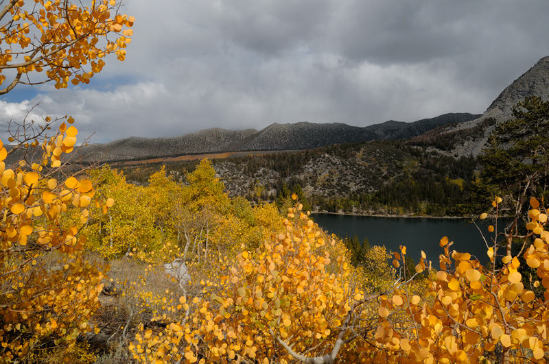 High Sierra lake surrounded with fall color