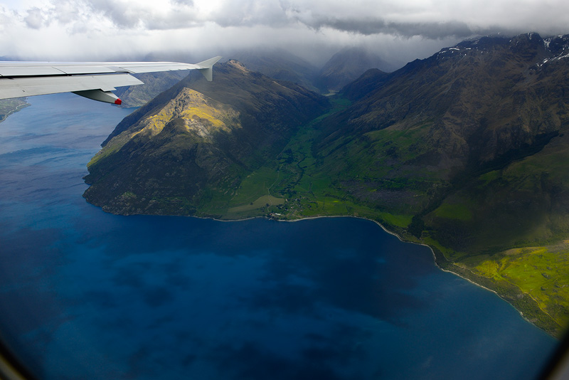 Aerial airplane view of Lake Wakatipu departing Queenstown New Zealand