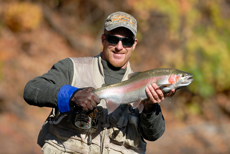 A buddy with a beautiful rainbow trout