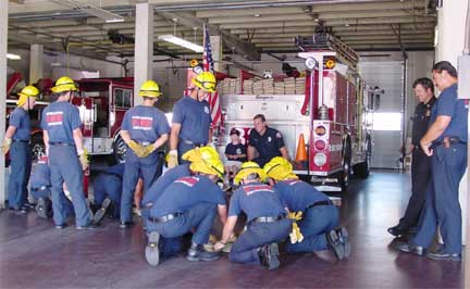 Trainees practiced rolling hoses