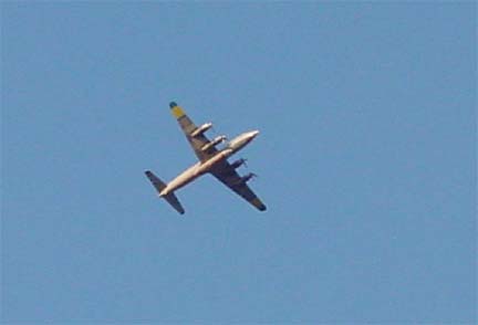 A big plane with four propellers