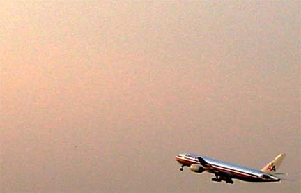 777 taking off Ontario Airport