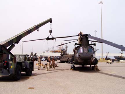 Putting the blades on a Chinook helicopter